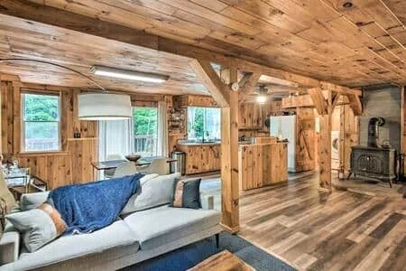 Living and dining area with wood stove
